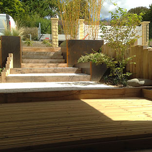 aménagement d'une terrasse par le paysagiste Vertet Bois à Romans-sur-Isère dans le département de la Drôme 26